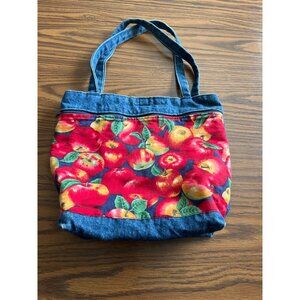Denim tote bag with colorful red apples on front